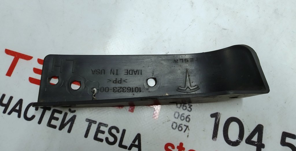 3 1016323-00-Z Wspornik tylnego lewego błotnika Tesla model S REST 1016323-00-C